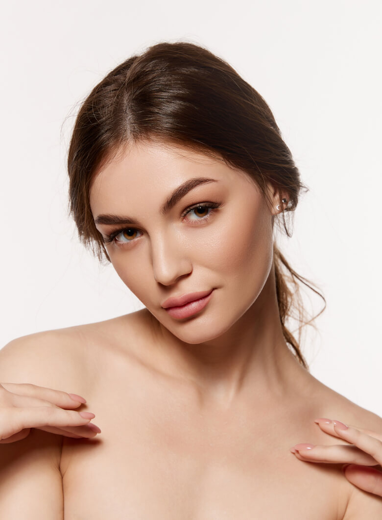 Close-up of a woman with glowing skin and natural makeup, embodying beauty and wellness, reflecting Skin & Body Med Spa's commitment to aesthetic and holistic care.
