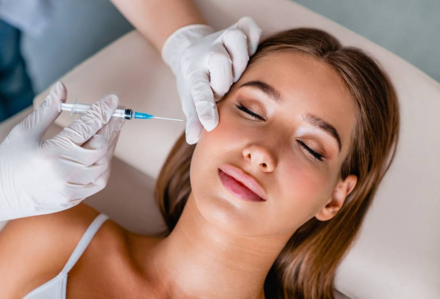 Woman receiving Botox injection in a medical spa setting, showcasing aesthetic treatment for beauty enhancement.